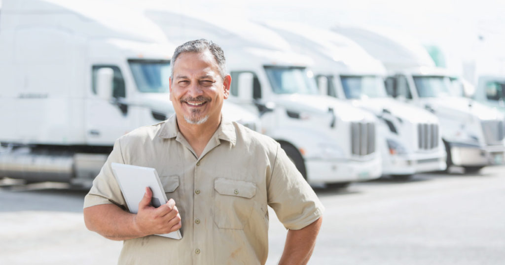 Man with fleet of trucks