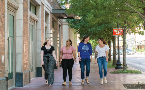 Apex employees walking downtown Fort Worth