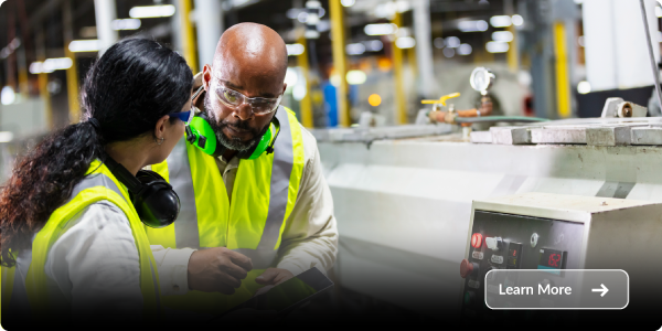 Manufacuring-industry Manufacturing team monitoring equipment and production process in industrial facility