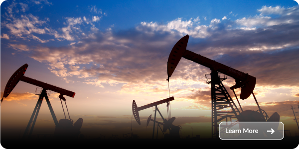 oil-field-industry Oil field pump jacks extracting energy resources at sunset in industrial landscape