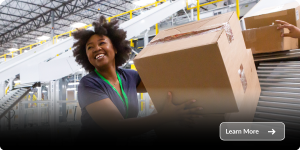 wholesale-dist-industry Warehouse employee sorting and moving packages on conveyor system in distribution center